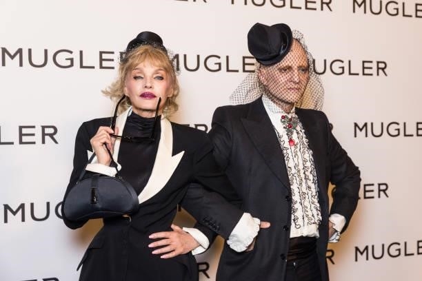 Arielle Dombasle and Ali Mahdavi attend the "Thierry Mugler : Couturissime