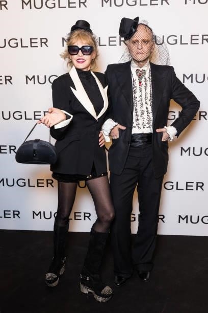 Arielle Dombasle and Ali Mahdavi attend the "Thierry Mugler : Couturissime