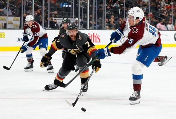Shane Bowers of the Colorado Avalanche shoots against Alex Pietrangelo of the Vegas Golden Knights in the first period of their preseason game at...