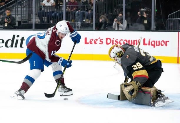 Jayson Megna of the Colorado Avalanche skates in against Laurent Brossoit of the Vegas Golden Knights during the second period of a game at T-Mobile...
