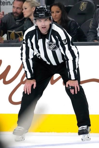 Linesman Brandon Gawryletz is seen on the ice during a game between the Vegas Golden Knights and Colorado Avalanche at T-Mobile Arena on September...