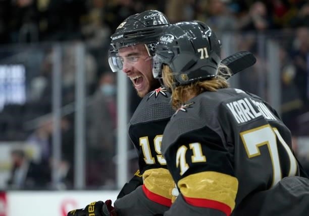 Reilly Smith and William Karlsson of the Vegas Golden Knights celebrate after a goal by Jonathan Marchessault during the third period against the...