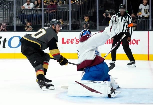 Nicolas Roy of the Vegas Golden Knights shoots against Jonas Johansson of the Colorado Avalanche during a practice shootout at T-Mobile Arena on...