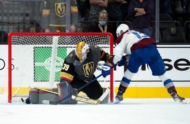 Laurent Brossoit of the Vegas Golden Knights makes a save against Valeri Nichushkin of the Colorado Avalanche during a practice shootout at T-Mobile...