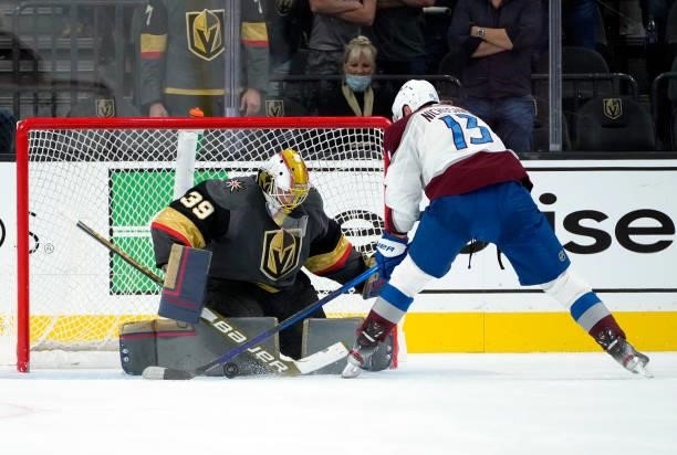 Laurent Brossoit of the Vegas Golden Knights makes a save against Valeri Nichushkin of the Colorado Avalanche during a practice shootout at T-Mobile...