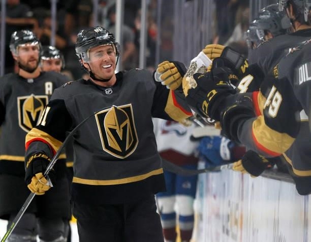 Jonathan Marchessault of the Vegas Golden Knights celebrates with teammates on the bench after scoring a third-period power-play goal against the...