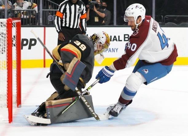 Laurent Brossoit of the Vegas Golden Knights blocks a shot by Artem Anisimov of the Colorado Avalanche during a practice shootout after their...