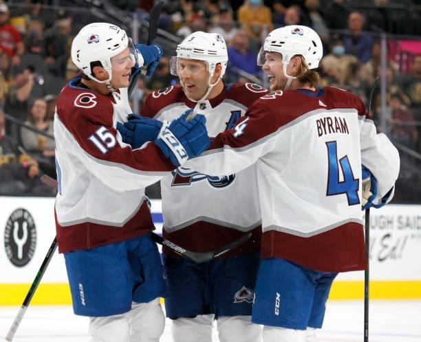 Shane Bowers, Jack Johnson and #Bowen Byram 4 of the Colorado Avalanche celebrate Johnson's third-period goal against the Vegas Golden Knights during...