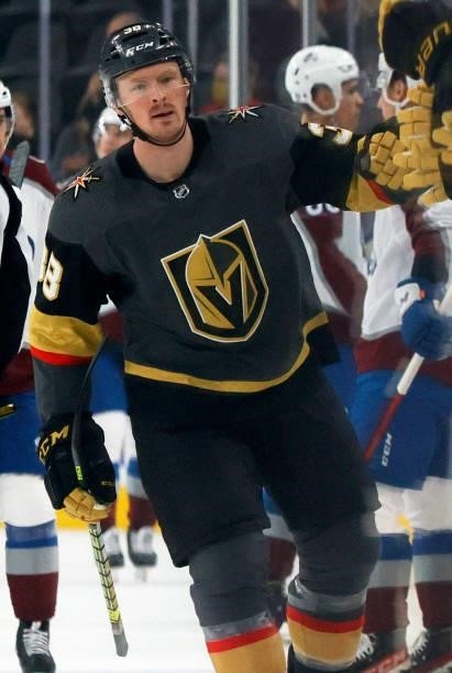 Patrick Brown of the Vegas Golden Knights celebrates with teammates on the bench after scoring a first-period goal against the Colorado Avalanche...