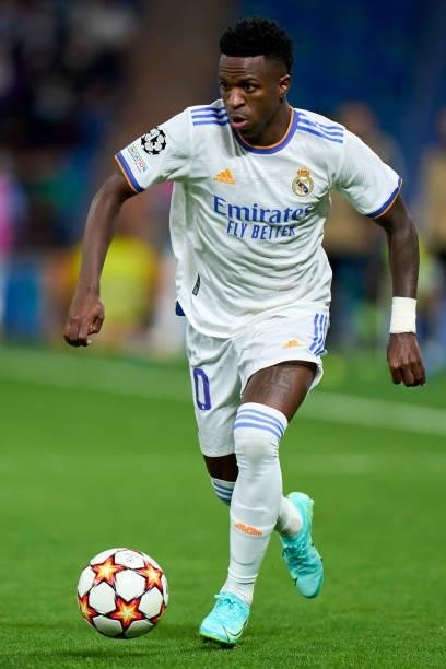 Vinicius Junior of Real Madrid runs with the ball during the UEFA Champions League group D match between Real Madrid and FC Sheriff at Estadio...
