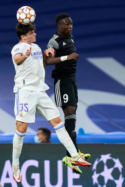 Miguel Gutierrez of Real Madrid battle for the ball Adama Traore of FC Sheriff during the UEFA Champions League group D match between Real Madrid and...