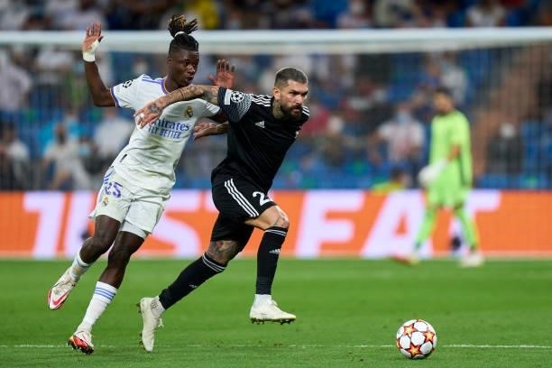 Eduardo Camavinga of Real Madrid battle for the ball Dimitrios Kolovos of FC Sheriff during the UEFA Champions League group D match between Real...
