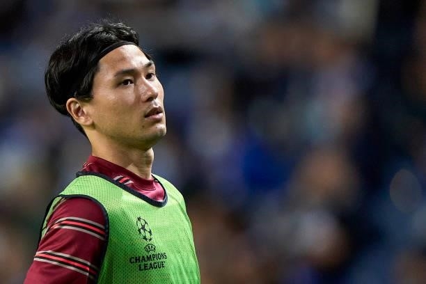 Takumi Minamino of Liverpool FC warms up during the UEFA Champions League group B match between FC Porto and Liverpool FC at Estadio do Dragao on...