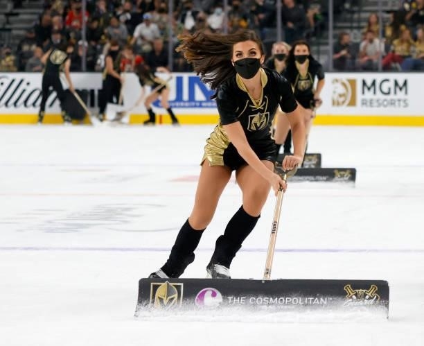 Members of the Knights Guard clean the ice during the Vegas Golden Knights' preseason game against the Colorado Avalanche at T-Mobile Arena on...