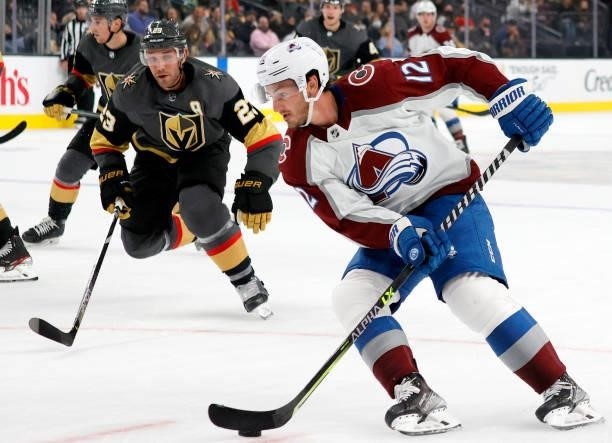 Jayson Megna of the Colorado Avalanche skates with the puck against Alec Martinez of the Vegas Golden Knights in the first period of their preseason...