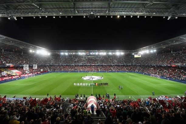 The teams of Red Bull Salzburg and Lille OSC line up on the pitch before the UEFA Champions League group G match between FC Red Bull Salzburg and...