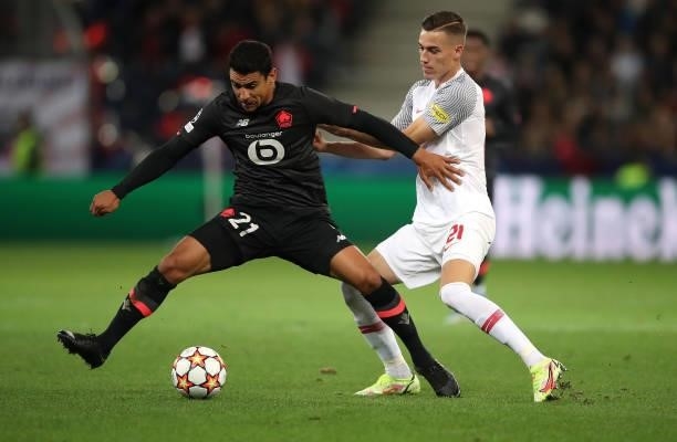 Benjamin Andre of Lille with Luka Sucic of FC Red Bull Salzburg during the UEFA Champions League group G match between FC Red Bull Salzburg and Lille...