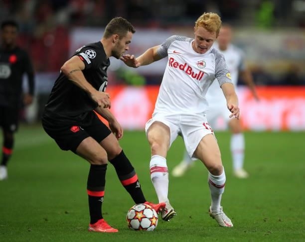 Gabriel Gudmundsson of Lille with Nicolas Seiwald of FC Red Bull Salzburg during the UEFA Champions League group G match between FC Red Bull Salzburg...