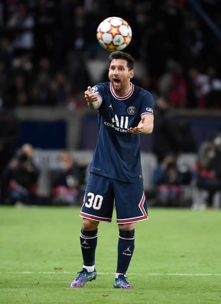 Lionel Messi of Paris Saint-Germain appeals to the assistant referee during the UEFA Champions League group A match between Paris Saint-Germain and...