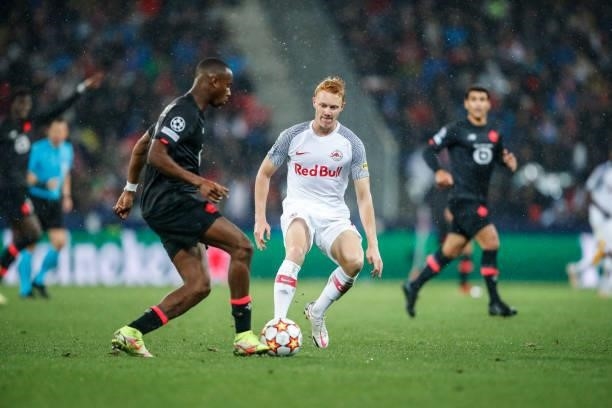 Nicolas Seiwald of FC Salzburg challenges Tiago Djalo of Lille OSC during the UEFA Champions League group G match between FC Salzburg and Lille OSC...