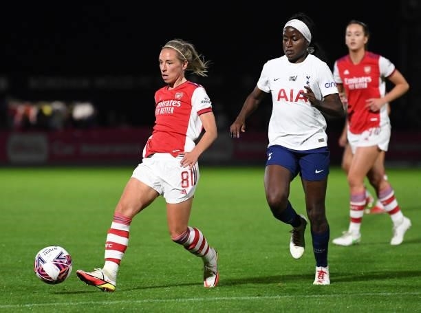 Jordan Nobbs of Arsenal passes the ball under pressure from Chi Ubogagu of Tottenham during the Women's FA Cup Quarter Final between Arsenal Women...