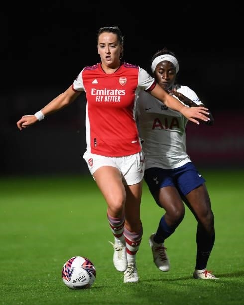 Anna Patten of Arsenal takes on Chi Ubogagu of Tottenham during the Women's FA Cup Quarter Final between Arsenal Women and Tottenham Hotspur Women at...
