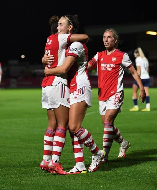 Caitlin Foord celebrates scoring Arsenal's 3rd goal with Nikita Parris and Jordan Nobbs during the Women's FA Cup Quarter Final between Arsenal Women...