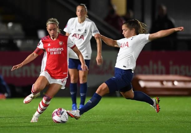 Jordan Nobbs of Arsenal is challenged by Kit Graham of Tottenham during the Women's FA Cup Quarter Final between Arsenal Women and Tottenham Hotspur...