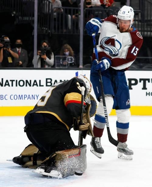 Laurent Brossoit of the Vegas Golden Knights makes a save against Valeri Nichushkin of the Colorado Avalanche in the third period of their preseason...