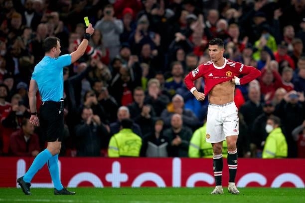 Cristiano Ronaldo of Manchester United is shown a yellow card by Match Referee, Felix Zwayer during the UEFA Champions League group F match between...