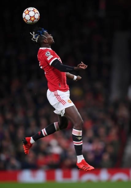Paul Pogba of Manchester United jumps to head the ball during the UEFA Champions League group F match between Manchester United and Villarreal CF at...