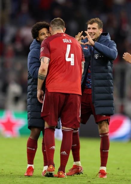 Leon Goretzka of Bayern Muenchen with Niklas Suele of FC Bayern Muenchen and Serge Gnabry of Bayern Muenchen during the UEFA Champions League group E...
