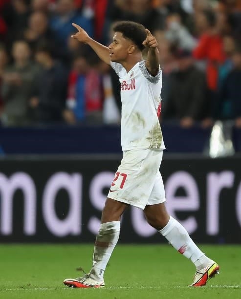 Karim Adeyemi of FC Red Bull Salzburg celebrates after scoring their side`s first goal during the UEFA Champions League group G match between FC Red...
