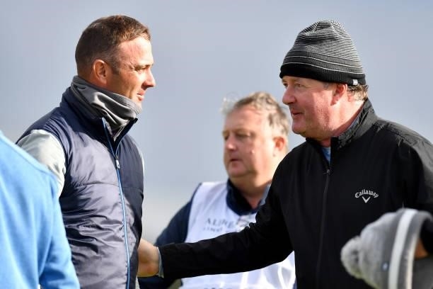 Piers Morgan talks to Ricardo Santos of Portugal during Day One of The Alfred Dunhill Links Championship at Kingsbarns on September 30, 2021 in St...
