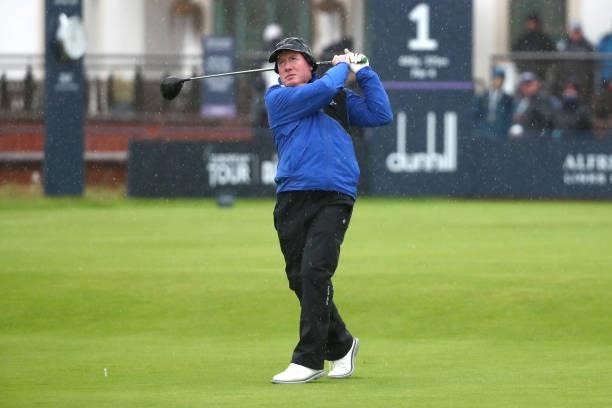 Gerry McManus plays his second shot on the 1st hole during Day One of The Alfred Dunhill Links Championship at Carnoustie Links on September 30, 2021...
