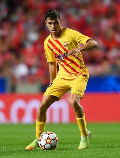 Pedri of FC Barcelona runs with the ball during the UEFA Champions League group E match between SL Benfica and FC Barcelona at Estadio da Luz on...