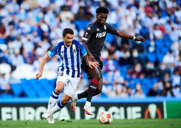 Ander Guevara of Real Sociedad duels for the ball with Aurelien Tchouameni of AS Monaco during the UEFA Europa League group B match between Real...