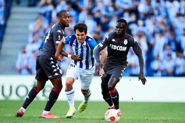 Mikel Oyarzabal of Real Sociedad duels for the ball with Kreppin Diatta of AS Monaco during the UEFA Europa League group B match between Real...