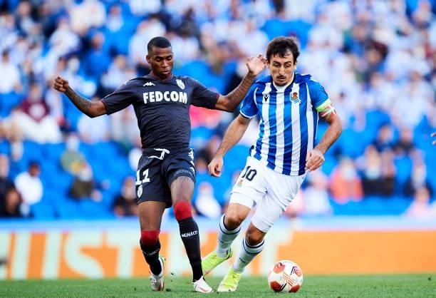 Mikel Oyarzabal of Real Sociedad duels for the ball with Jean Lucas of AS Monaco during the UEFA Europa League group B match between Real Sociedad...