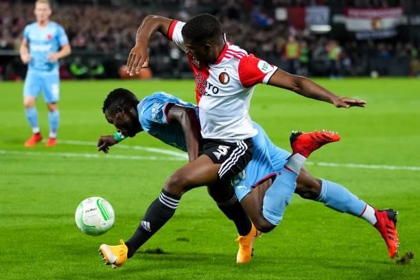 Ubong Ekpai of Slavia Prague and Tyrell Malacia of Feyenoord battle for possession during the UEFA Conference League Group Stage match between...