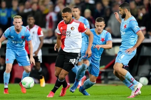 Cyriel Dessers of Feyenoord and Aiham Ousou of Slavia Prague battle for possession during the UEFA Conference League Group Stage match between...