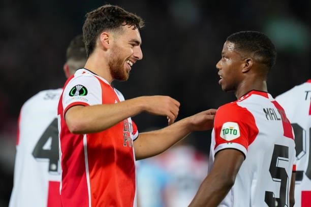 Orkun Kokcu of Feyenoord celebrates with Tyrell Malacia of Feyenoord after scoring his sides first goal during the UEFA Conference League Group Stage...