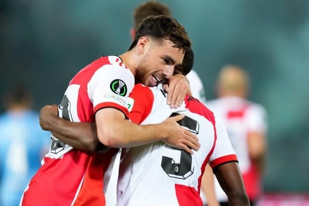 Orkun Kokcu of Feyenoord celebrates with Tyrell Malacia of Feyenoord after scoring his sides first goal during the UEFA Conference League Group Stage...