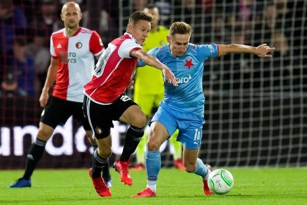 Jens Toornsta of Feyenoord and Jan Kuchta of Slavia Prague during the UEFA Conference League Group Stage match between Feyenoord and Slavia Prague at...