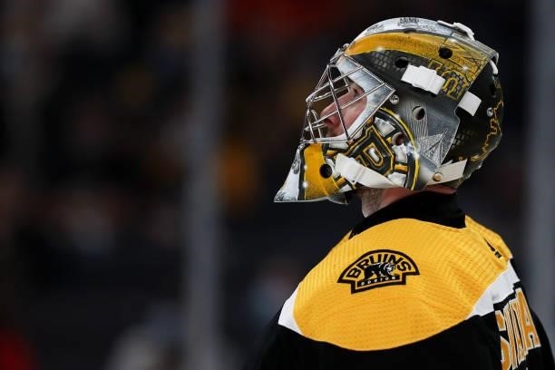 Jeremy Swayman of the Boston Bruins looks on during the second period of the preseason game at TD Garden on September 30, 2021 in Boston,...
