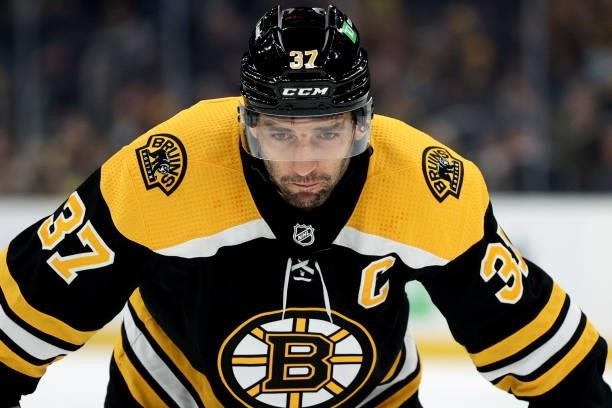 Patrice Bergeron of the Boston Bruins looks on during the first period of the preseason game against the Philadelphia Flyers at TD Garden on...