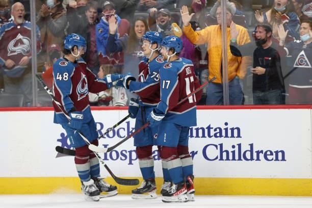 Sampo Ranta of the Colorado Avalanche is congratulated by Dennis Gilbert and Tyson Jost after scoring against the Minnesota Wild in the second period...