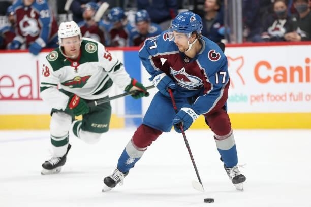 Tyson Jost of the Colorado Avalanche pass the puck against the Minnesota Wild in the second period at Ball Arena on September 30, 2021 in Denver,...