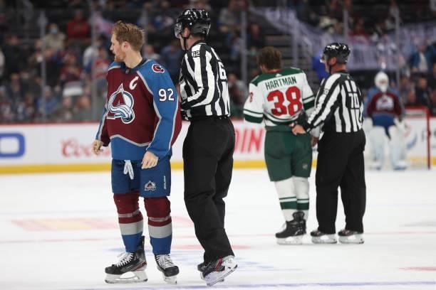 Gabriel Landeskog of the Colorado Avalanche is separated from Ryan Hartman of the Minnesota Wild after fighting in the second period at Ball Arena on...