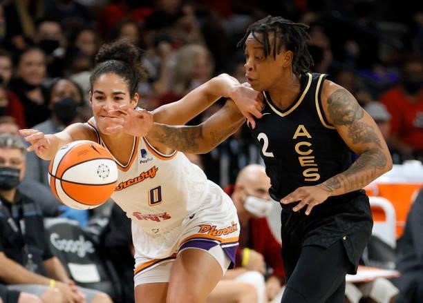 Riquna Williams of the Las Vegas Aces steals the ball from Kia Nurse of the Phoenix Mercury during Game Two of the 2021 WNBA Playoffs semifinals at...